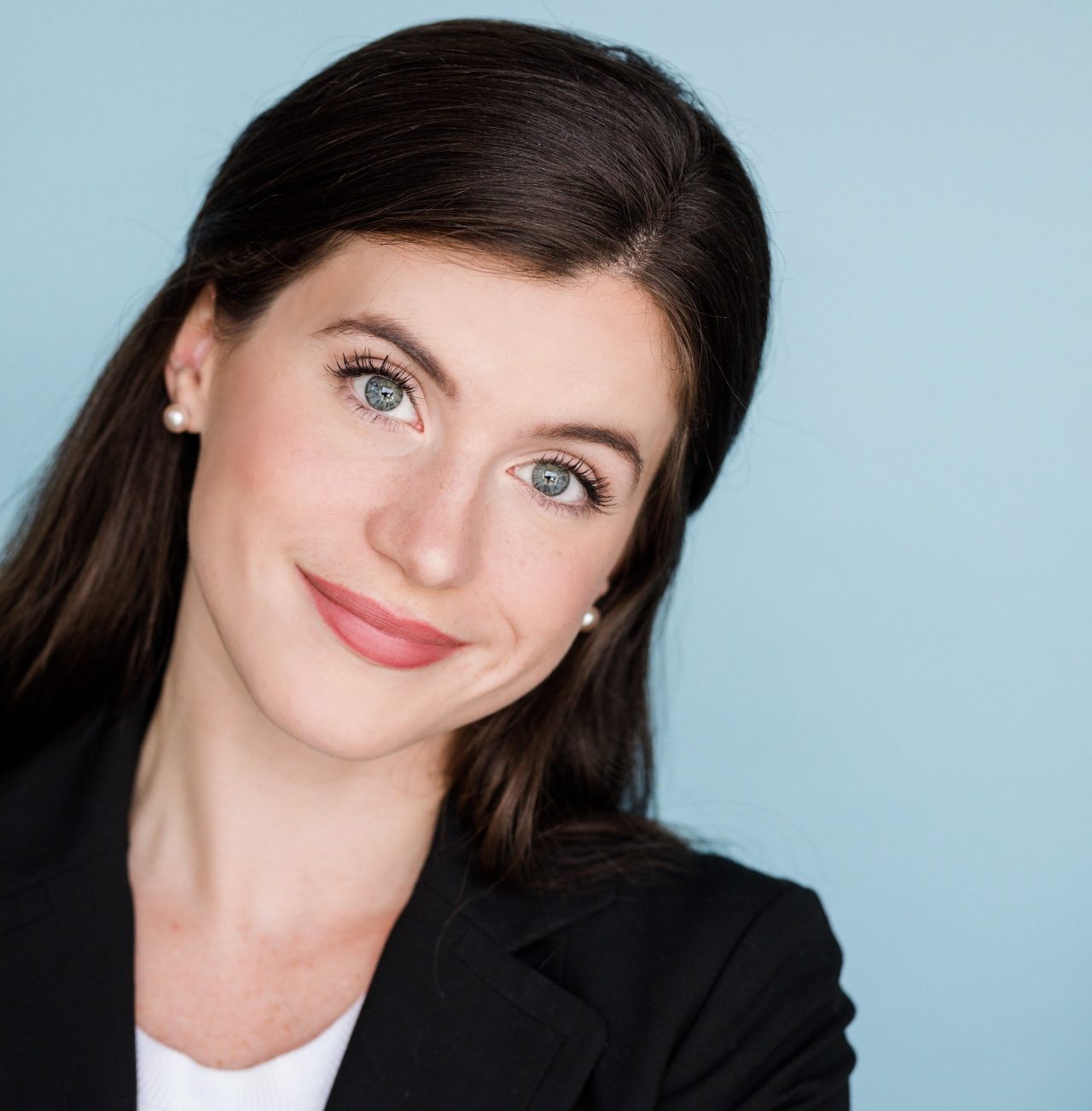 Woman with brunette hair smiling